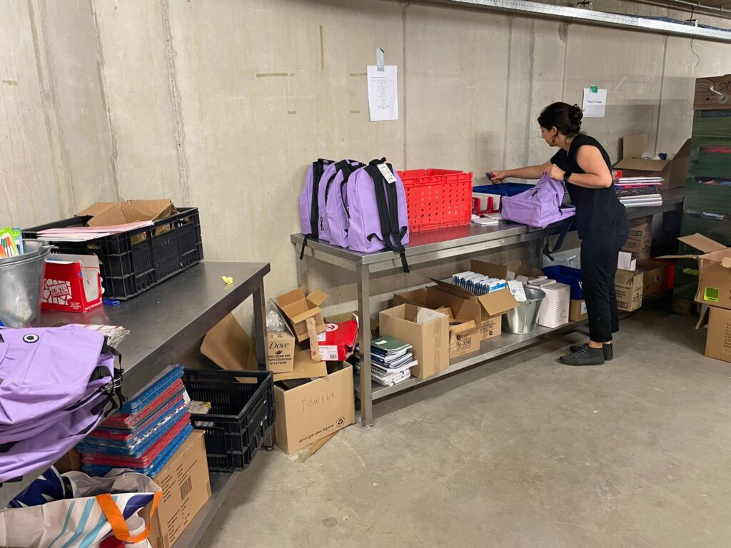 Sorting backpacks in our warehouse